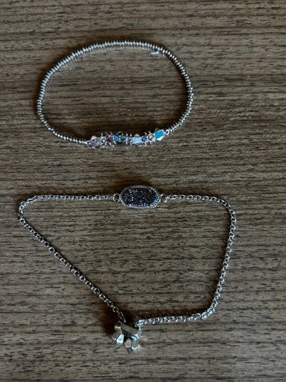 Two Kendra Scott bracelets.